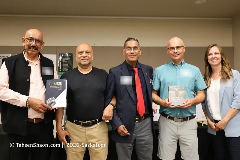 Five guests, two of them holding books, one of them Change Anesthesiology